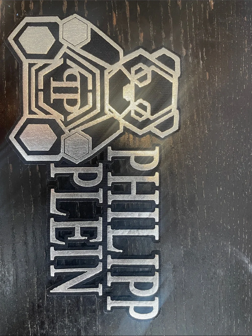Philipp Plein Black and Silver Logo Accent Plaque